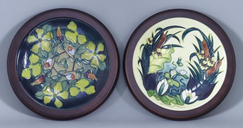A Moorcroft Pottery Plate With Lamia Design, decorated with...