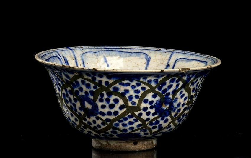 A PAINTED AND GLAZED CERAMIC BOWL Iran, 16th-17th