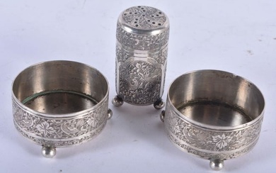 A PAIR OF 19TH CENTURY ISLAMIC SILVER SALTS and another. 117 grams. Largest 5.5 cm x 3 cm. (3)