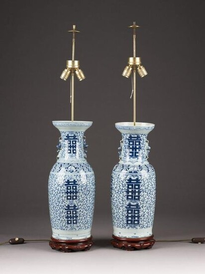 A PAIR OF BLUE-AND-WHITE VASE WITH CHINESE CHARACTERS