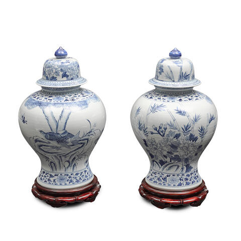A PAIR OF CHINESE BLUE AND WHITE PORCELAIN COVERED VASES