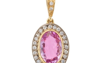 A PINK SAPPHIRE AND DIAMOND PENDANT in 18ct yellow gold, set with an oval cut pink sapphire of