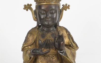 A Parcel Gilt Bronze Figure of the Buddha Shakyamuni