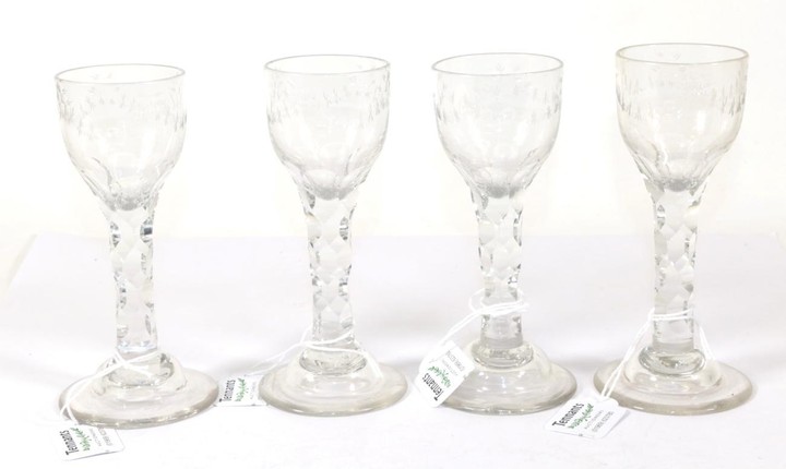 A Set of Four Wine Glasses, circa 1790, the ovoid...