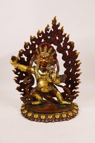A Tibetan bronze figure of a wrathful deity with painted and...