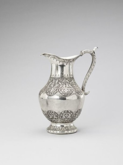 A VERY LARGE SILVER PLATED PITCHER, 19TH CENTURY...