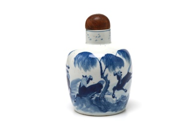 A blue and white porcelain tea caddy with wooden cover painted with horse under the pine tree