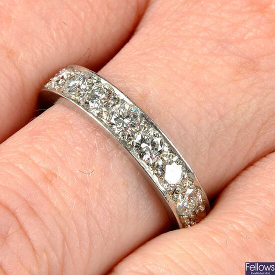 A brilliant-cut diamond full eternity ring.
