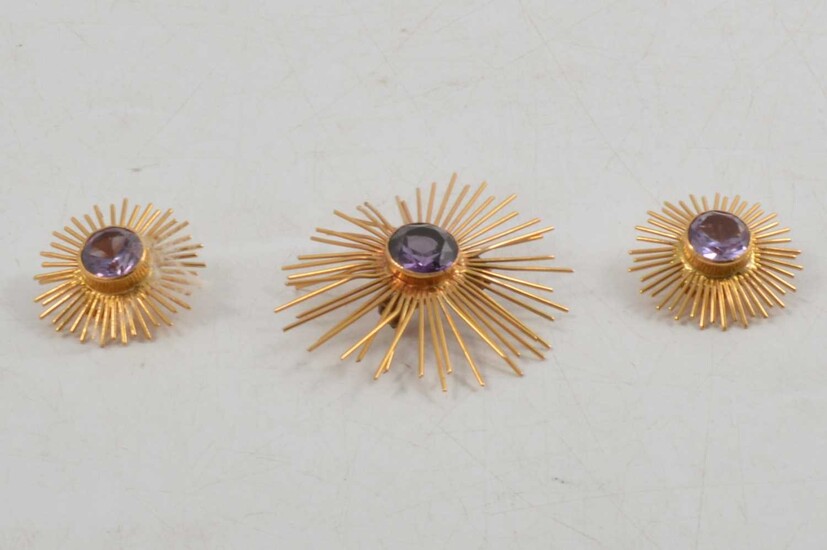 A brooch and earring suite, synthetic corundum made to simulate alexandrite.