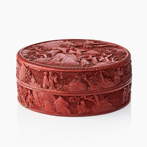 A carved Chinese cinnabar lacquer box and cover