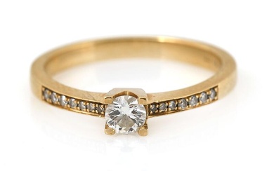 A diamond ring set with a brilliant-cut diamond weighing app. 0.20 ct....