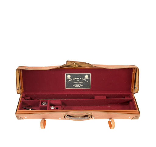 A fine leather single guncase with canvas cover by J. Purdey & Sons