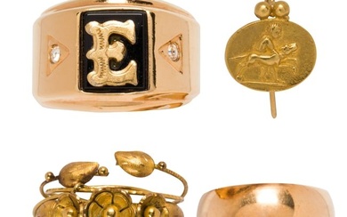 A group of gold jewelry and a yellow metal ring