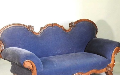 A large 19th century continental blue upholstered show frame sofa...