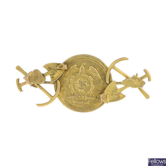 A late 19th century 9ct gold 'digger' brooch.
