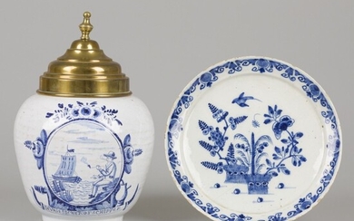A lot comprising various pottery a.w. a plate with floral decoration and a tobacco jar...