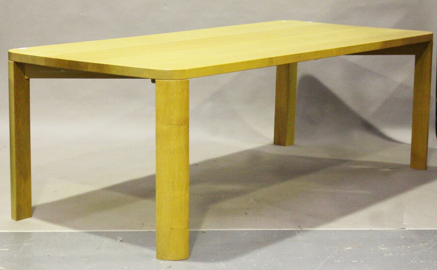 A modern solid oak dining table with curved corners, height 75cm, length 222cm, depth 100cm, togethe