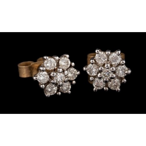 A pair of 9 carat gold diamond cluster ear studs,: set with ...