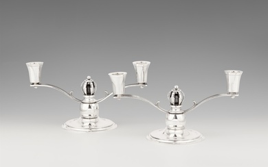 A pair of Art Deco Copenhagen silver candlesticks