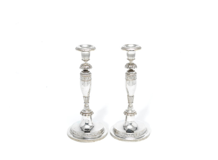 A pair of German silver candlesticks