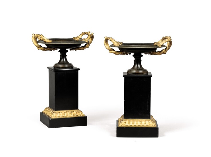 A pair of Napoleon III gilt and patinated bronze and black marble mounted tazzas
