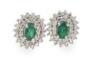A pair of ear studs each set with an emerald encircled by numerous diamonds, mounted in 14k white gold. (2) – Bruun Rasmussen Auctioneers of Fine Art