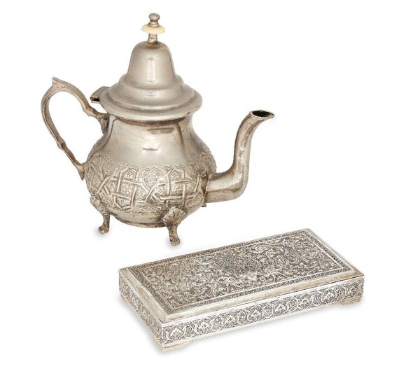 A rectangular Persian cigarette box, hallmarked for Persian silver, 20th century, the lid chased with birds and foliage, the sides with repeating foliate pattern, 9.1 x 18.1cm, together with a white metal teapot, the repousse body apparently...