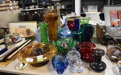 A selection of vintage glass in various colours including decanter and vases.