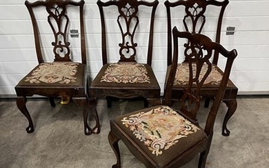 A set of four Chippendale-style dining chairs, on cabriole a...
