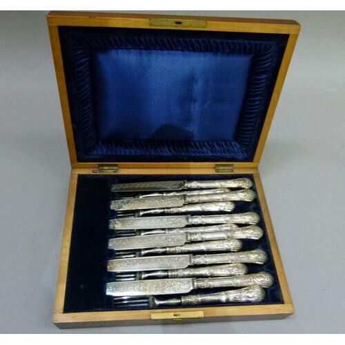 A set of six Victorian silver plated dessert knives and fork...