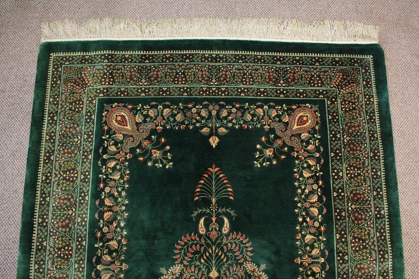 A stunning Persian emerald green silk Qum carpet/wall hangin...