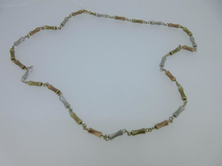 A tri-coloured gold necklace by Mappin & Webb