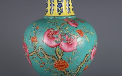A vase with yellow ground blue and white and green ground with famille rose and pomegranate pattern