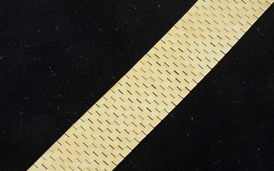 A yellow metal 26mm wide flexible brick construction bracelet.