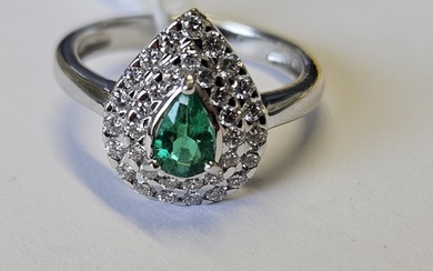 An 18ct Gold, Diamond and Emerald cluster Ring, size K1/2.
