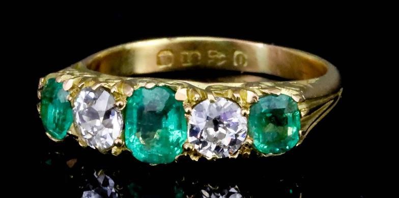 An Emerald and Diamond Five Stone Ring, 20th Century,...