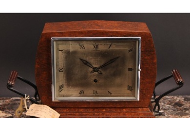 An early 20th century oak double-dial club timepiece, 20cm r...