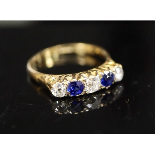An early/mid 20th century 18ct gold and platinum, two stone ...