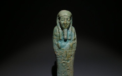 Ancient Egyptian Faience, Ushabti. 11,1 cm H. Ancient Egypt, Late Period, 664 - 323 BC Figure