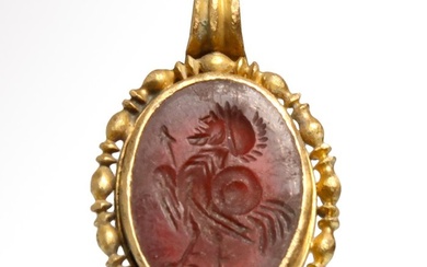 Ancient Roman Cornelian and gold Pendant with Cornelian Intaglio with Hybrid Creature
