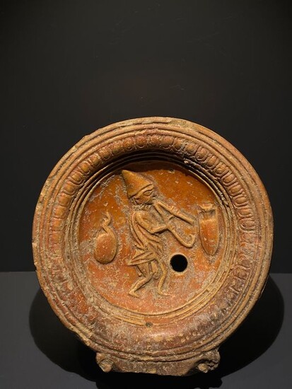 Ancient Roman Terracotta Oil lamp. Erotic phallic musical scene and amphora. c. 1st Century AD. 8 cm L. Very nice decoration.