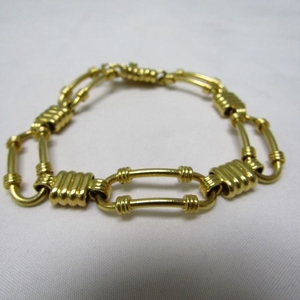 Articulated unisex bracelet in 18 kt gold19 cm 34 g