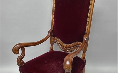 Circa 1900 Carved Walnut Arm Chair with original mohair upholstery. Quality hand carved elegant