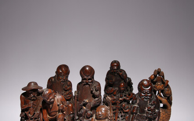 EIGHT LARGE CHINESE BAMBOO FIGURES