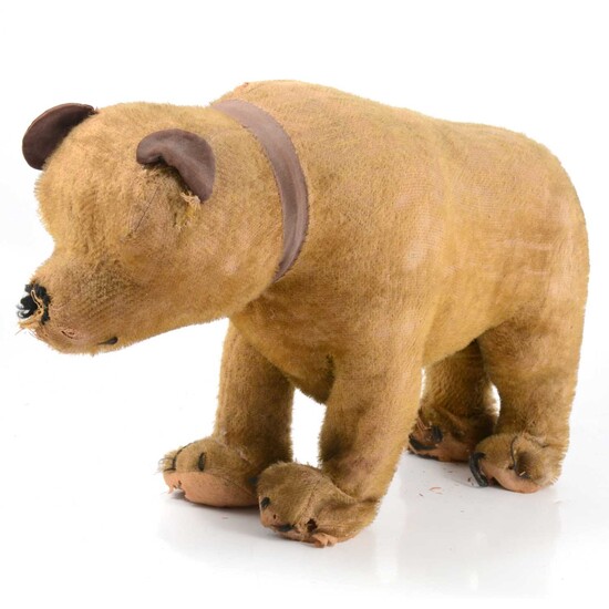 Early 20th-century straw-filled bear, 45cm in length.