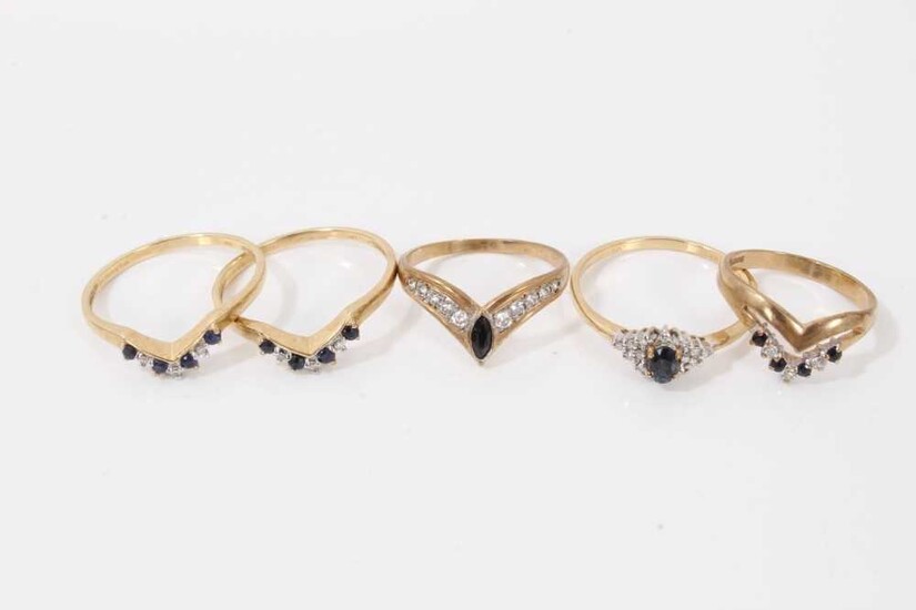 Five 9ct gold blue gem stone dress rings