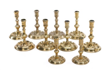 Five pairs of Danish 18th century Baroque brass candlesticks, baluster stems on...