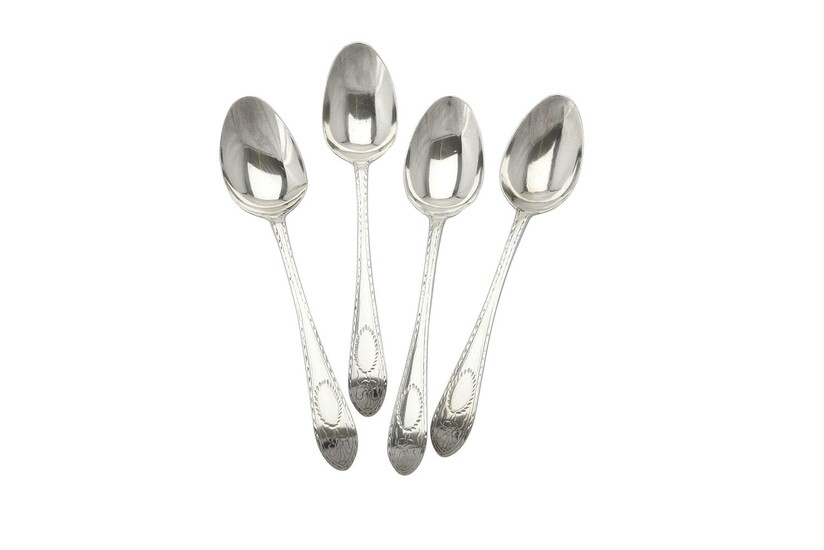 Four George III Irish Provincial silver bright cut dessert spoons by John Nicholson