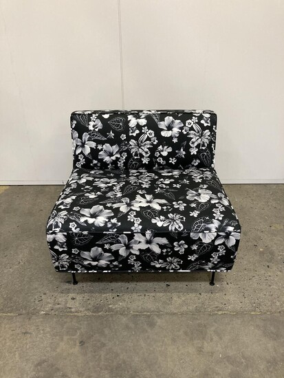 SOLD. Greta Magnusson-Grossman: "Modern Line" Lounge Chair upholstered with fabric with flower print, legs of black lacquered metal. Manufactured by Gubi. – Bruun Rasmussen Auctioneers of Fine Art