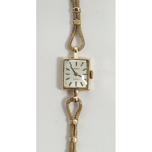 Lady's 9ct gold Tissot wristwatch with square dial, baton nu...